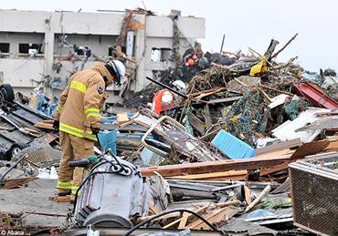 Japon : le bilan des victimes s�alourdit - Elle